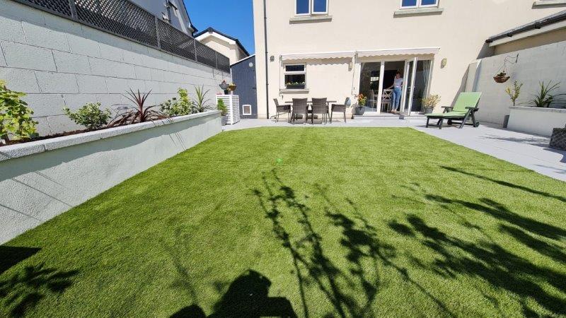 paved terrace artificial grass sunny