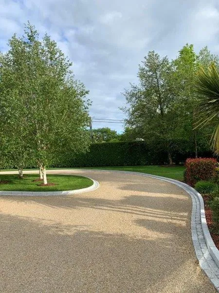 gravel driveway stone circular trees middle